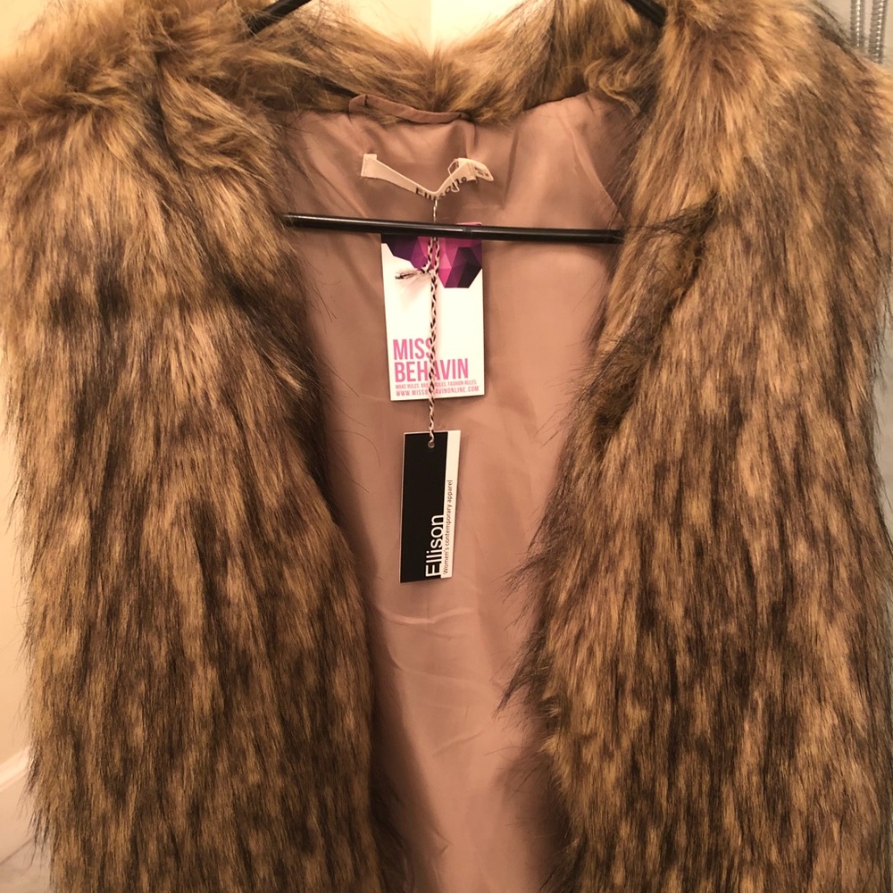 NWT - Never been worn before amazing vest!